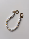 Короткий ланцюжок Golden Pearl із білих перламутрових, прозорих і золотистих намистин із золотистими кільцями-застібками